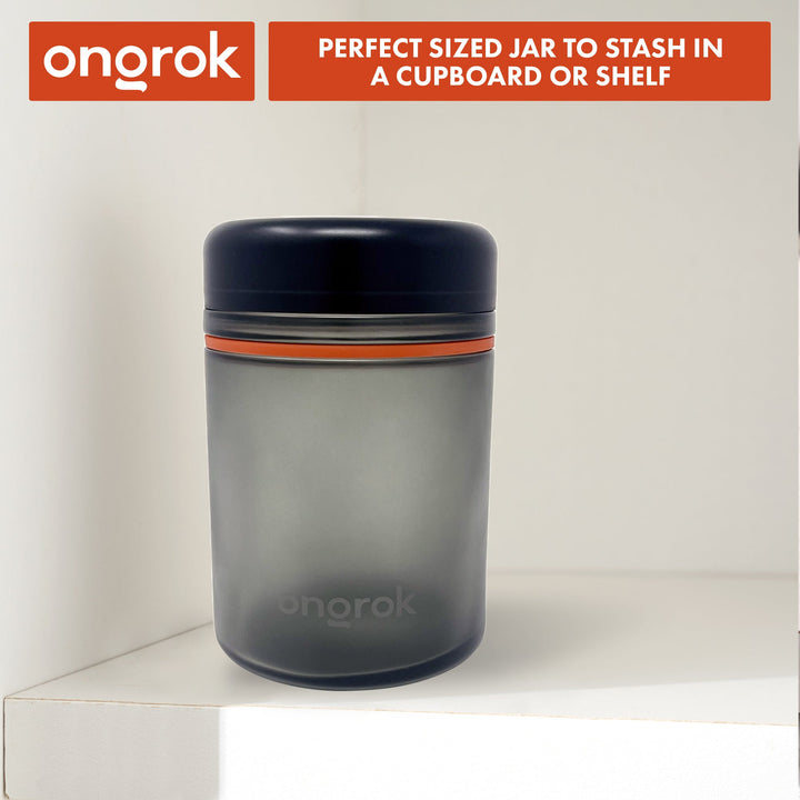ONGROK 1000ml Child Resistant Storage Jar with orange ring on a shelf, headed sized for a cupboard or shelf