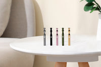 Taster Bat - Aluminum One-Hitter ongrok us, all five colors displayed together on a side table