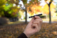 Taster Bat - Aluminum One-Hitter ongrok us Black held in hand