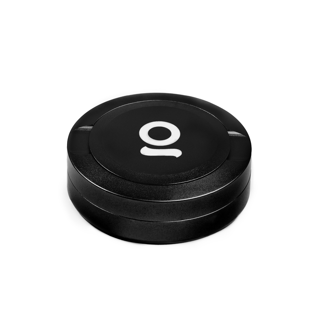 ONGROK Pouch Storage Puck in black, closed, angled view of the logo lid