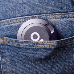 ONGROK Pouch Storage Puck in gray tucked into a jeans pocket