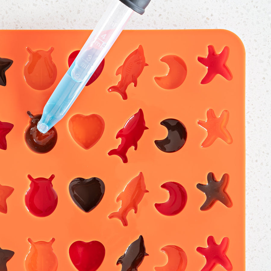 SAGOOITS Silicone Gummy Candy Molds Set - 4 Mini Shapes (Dinosaur, Bear, Heart, Donut) With Droppers